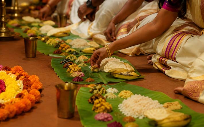 Onam Festival in Kerala with Pookalam, Sadya and traditional cultural celebrations